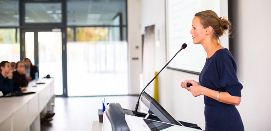 Woman presenting to audience